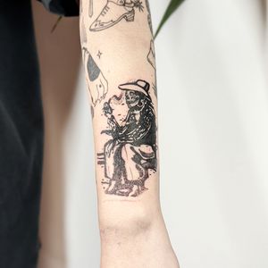 Get inked with a striking black and gray neo traditional forearm tattoo featuring a skull and skeleton by George Antony.