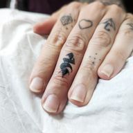Finger Calligraphy Tattoo