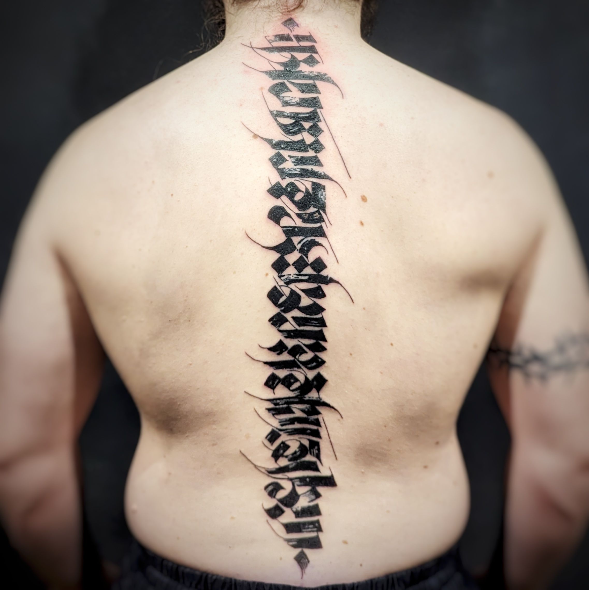 Spine Lettering Spine Calligraphy • Tattoodo