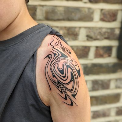Elegant blackwork pattern tattoo on the shoulder by artist George Antony. Achieve a bold and striking look with this unique design.