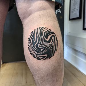 Elegant blackwork pattern tattoo beautifully inked on lower leg by talented artist George Antony. Perfect blend of tradition and modern artistry.