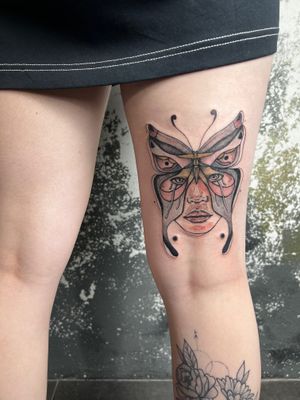 Express your individuality with this stunning new school tattoo of a woman's eye by the talented artist Kiky Flore on your upper leg.