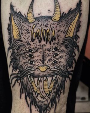 Vibrant new school style tattoo featuring a majestic wolf and a personalized name on the upper arm. By talented artist Elisa Thirteen.