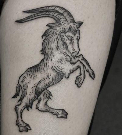 Capture the beauty of the mystical goat with this stunning black and gray piece by Elisa Thirteen.