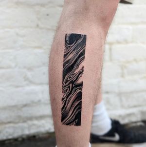 Adorn your lower leg with a stunning blackwork pattern tattoo by talented artist George Antony.