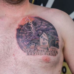 Black-and-gray chest tattoo featuring a clock and farm details, expertly done by Soheyl Astangi.