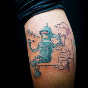 Get a futuristic robot design with a motivational quote by Soheyl Astangi in small lettering and new school style on your lower leg.