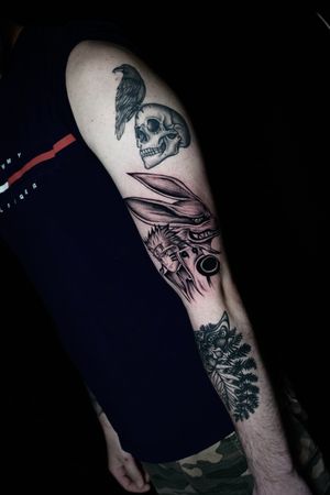 Capture the spirit of Naruto with this stunning blackwork fox tattoo on your upper arm. Designed by the talented tattoo artist, Miss Vampira.