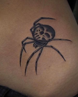 Get a beautifully detailed spider tattoo on your arm, done in a modern neo-traditional style by the talented artist Alex Travers.