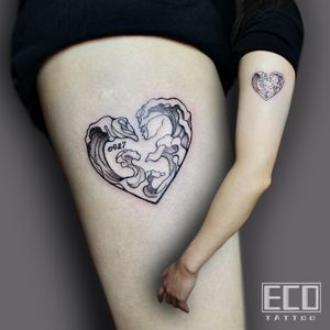 Exquisite black and gray fine line tattoo featuring a heart and waves motif by Lin Feng. Perfect for those wanting a unique and elegant design on their upper arm.