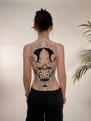 Experience the elegance of a Japanese henya tattoo on your back, expertly crafted by Federico Tronconi. Embrace the mystique and tradition of Japanese artistry.