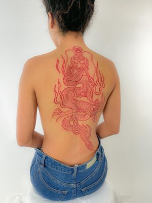 Experience the power and beauty of a traditional Japanese dragon tattoo expertly crafted by Federico Tronconi on your back.