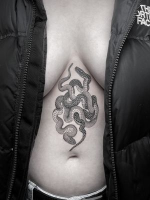 Beautiful traditional snake design by Federico Tronconi, perfect for sternum placement.