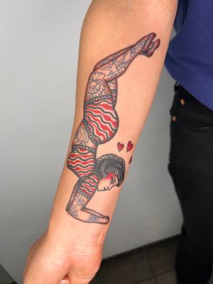 Get a classic traditional tattoo of a woman with tattoos, expertly done by Claudia Trash on your forearm.