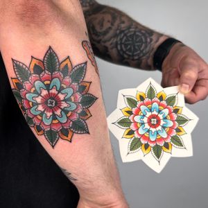 Elegant ornamental design by Claudia Trash featuring a mandala and leaf motif. Perfect for forearm placement.