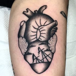 Get inked by Claudia Trash with this unique heart design on your lower leg, combining dotwork and traditional styles.
