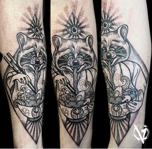 Unique blackwork design by VV Swain Tattoo combining a raccoon and ramen motif for a bold statement piece.