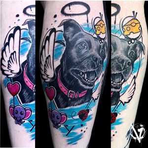Experience the perfect blend of new school and realism with this stunning tattoo featuring an elephant and a dog, by VV Swain Tattoo.