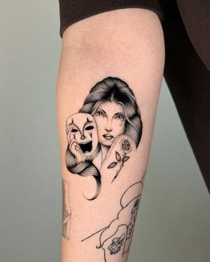 By Joshua Williams on forearm, featuring a black and gray micro realism style mask design.