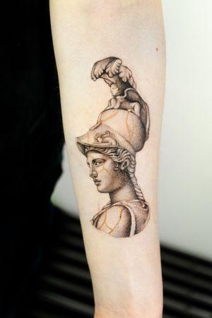 Capture the beauty of Berlin with this black and gray forearm tattoo featuring a stunning statue of a woman. Perfect for art lovers! (200 characters)