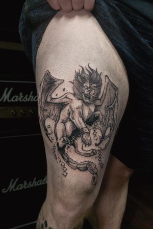 Elegant black & gray fine line tattoo adorning your upper leg, featuring a powerful lion, dragon, and wings by the talented Luca Salzano.