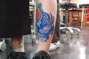 Get a fierce and stunning Japanese dragon tattoo on your lower leg by the talented artist Bananajims. Embrace the ancient symbolism and power of the mythical creature.