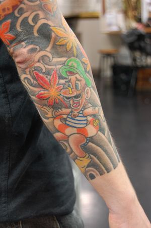 Get ready to level up your tattoo game with this vibrant new-school style Luigi tattoo by the talented artist Bananajims.