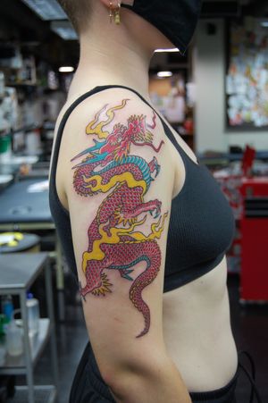 Experience the power of the mythical dragon with this intricate Japanese style tattoo by the talented artist Bananajims.