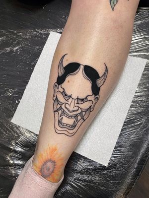 Unique blackwork and dotwork design by Joanna Webb, featuring traditional Japanese hannya mask with horns on the shin.