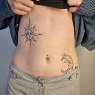 Healed stomach composition of a sun and a moon design