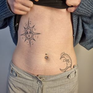 Healed stomach composition of a sun and a moon design