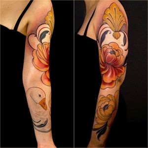 Adorn your arm with a vibrant neo-traditional flower sleeve tattoo, expertly crafted by the talented artist Edyta.