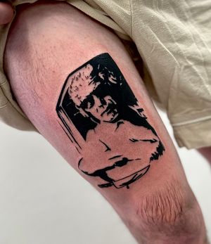Capture the essence of masculinity with this bold blackwork silhouette tattoo by Miss Vampira on the upper leg.