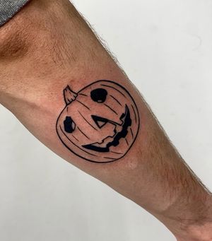 Get into the Halloween spirit with this blackwork pumpkin tattoo by Miss Vampira. Perfect for adding a spooky touch to your forearm.