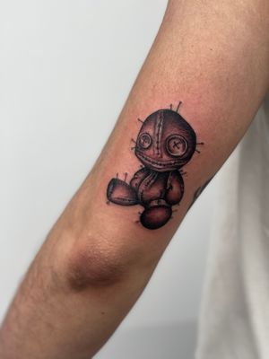 Unique voodoo doll design tattoo for your arm, by the talented artist Miss Vampira.