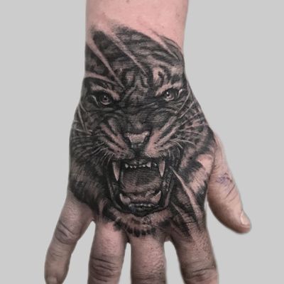 One more tiny session to finish this #tiger #hand tattoo. . . . #animal #animaltattoo #tigertattoo #realism #realistic #blackandgrey #bng