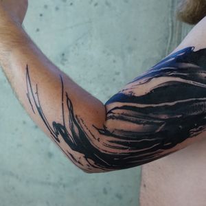 Get a stunning blackwork pattern tattoo on your arm by Rachel Aspe at Bellatrix Tattoo for a unique and surreal look.