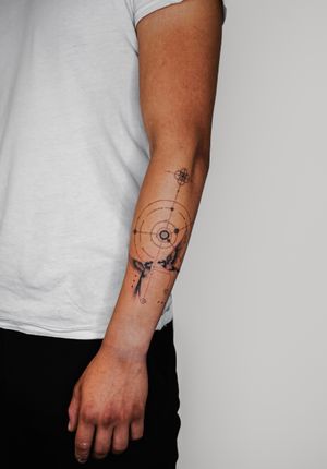 Elegant fine line and micro realism tattoo featuring geometric birds on lower arm by talented artist Gabriele Edu.
