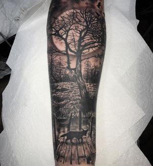 Wolf Forest Moon Black & Grey Realism Tattoo done at Hammersmith Tattoo London