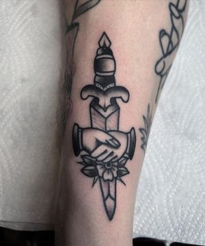 Hand Shake and Dagger Traditional Tattoo