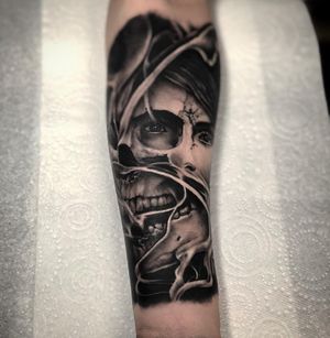 Woman and Skull Morph Black & Grey Realism Tattoo done at Hammersmith Tattoo London