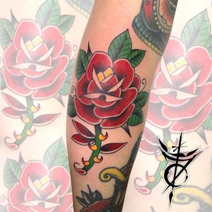 Rose and thorns Traditional Tattoo done at Hammersmith Tattoo London