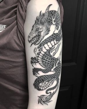 Engraving Dragon Tattoo done at Hammersmith Tattoo London
