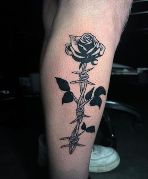 Blackwork Rose and Barbed Wire Tattoo done at Hammersmith Tattoo London