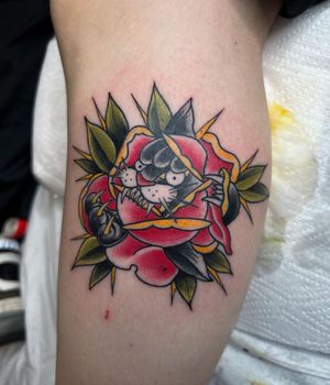 Traditional Puma and Rose Tattoo done at Hammersmith Tattoo London