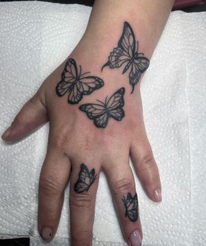 Butterfly Hand and Finger Tattoo done at Hammersmith Tattoo London