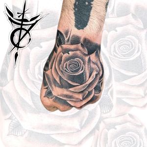 Realism Rose on Hand Tattoo done at Hammersmith Tattoo London