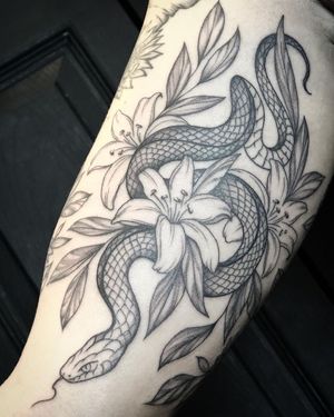 Flowers and Snake Tattoo done at Hammersmith Tattoo London