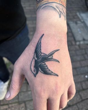 Swallow Traditional Tattoo done at Hammersmith Tattoo London