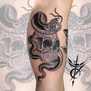 Traditional Snake and Skull Tattoo done at Hammersmith Tattoo London